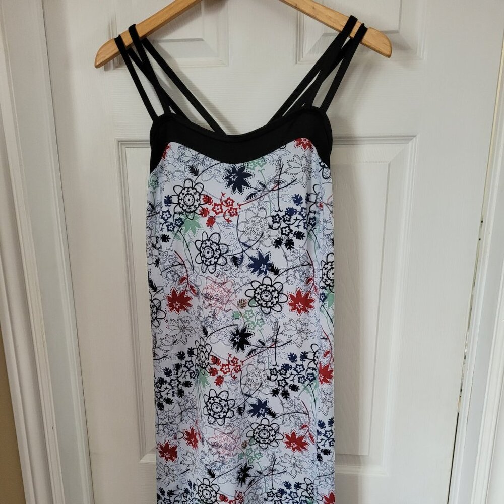 Stonewear Designs dress with a floral pattern and black straps